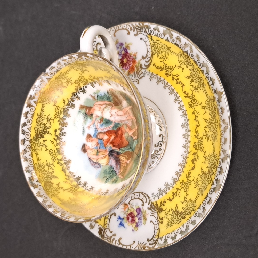 Vintage bone china demitasse cup and saucer with Venetian ladies and florals